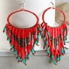 Orecchini pendenti con perle rosse multicolori