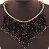 Collier de perles noires dorées