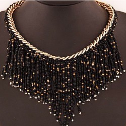 Collier de perles noires dorées