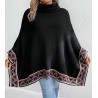 Black turtleneck poncho with ethnic pattern